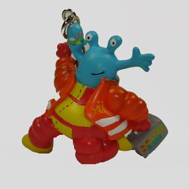 Xü mit Koffer als Schlüsselanhänger